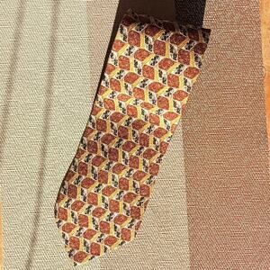 Ermenegildo Zegna luxury silk tie. Made in Italy. Brown, gold, & black geometric